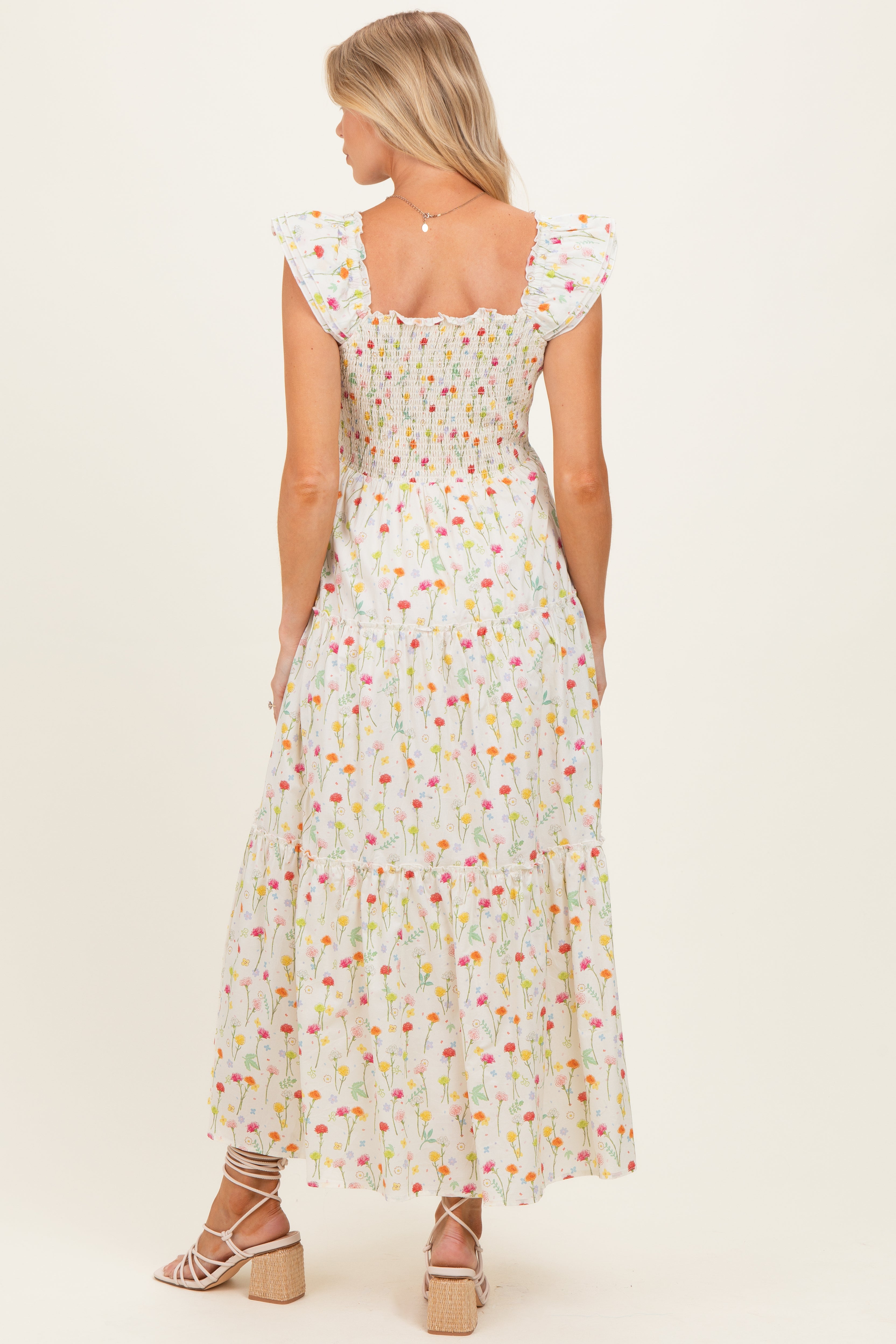 Florales Umstands-Maxikleid mit Smok-Detail in Creme