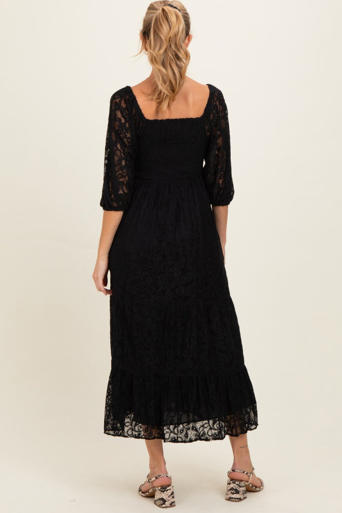 Schwarzes gesmoktes Umstands-Midikleid aus Spitze
