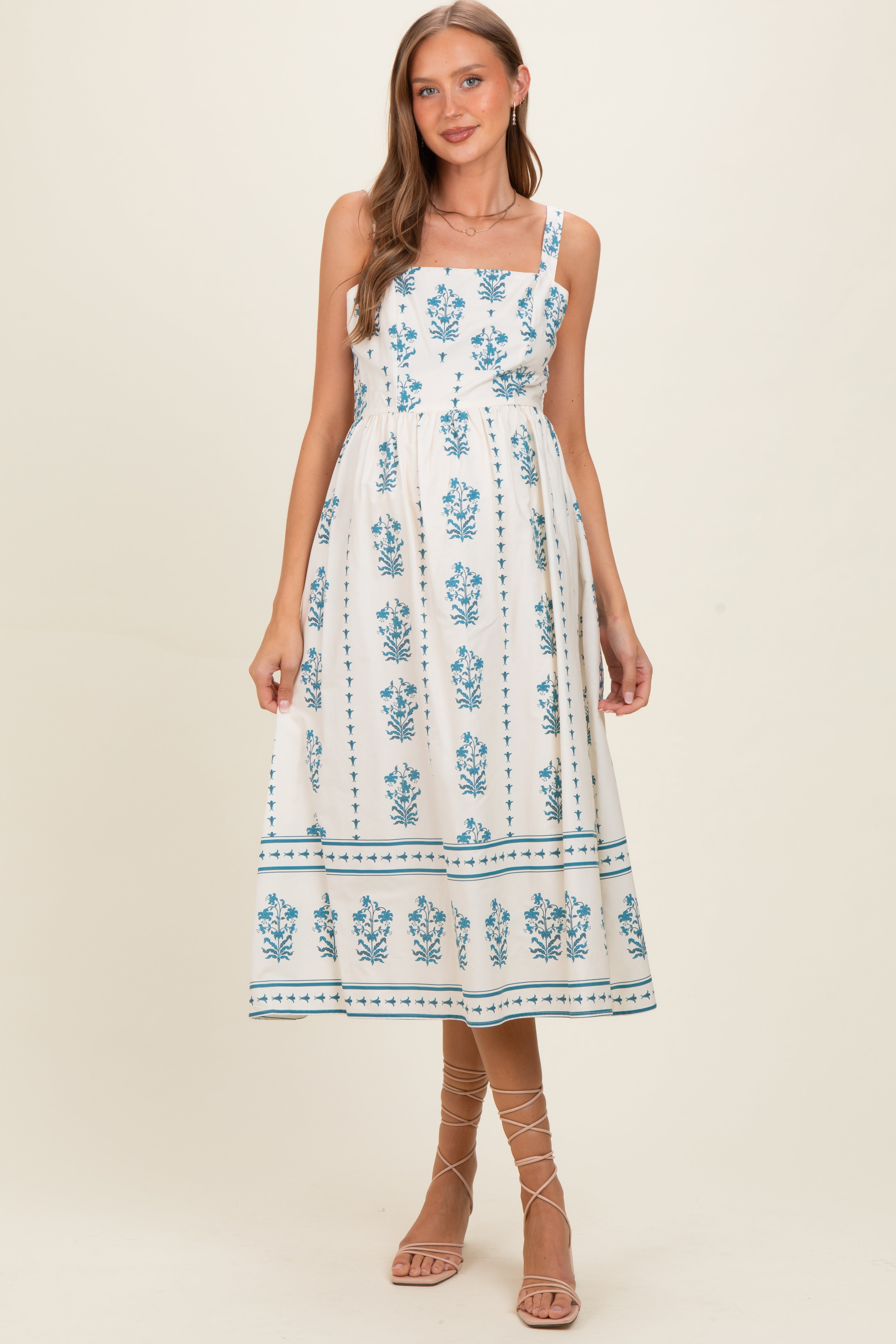 Cremefarbenes geblümtes Umstands-Midikleid mit Karree-Ausschnitt