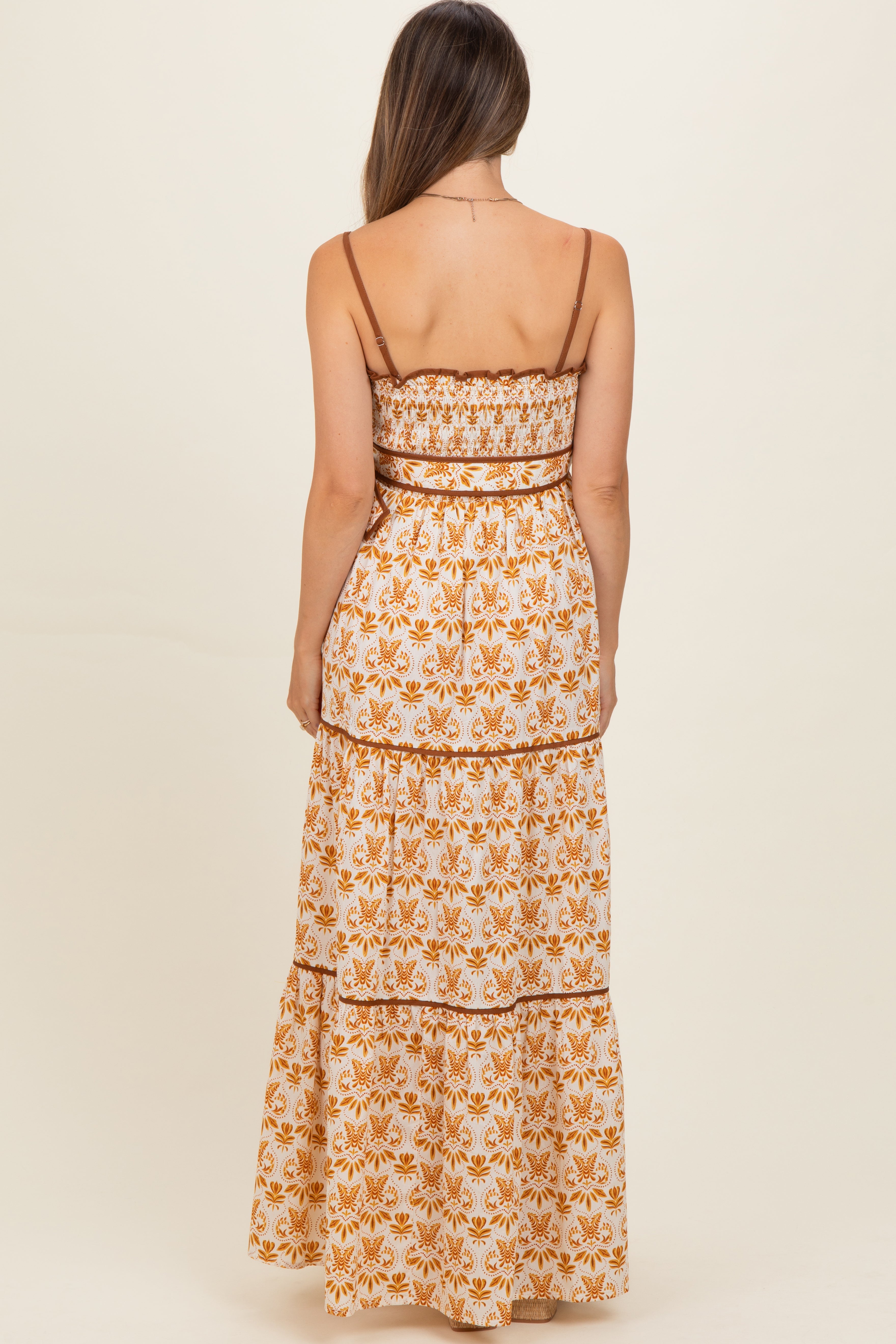 Umstandsmaxikleid in Camel mit Print und Smok-Bustier