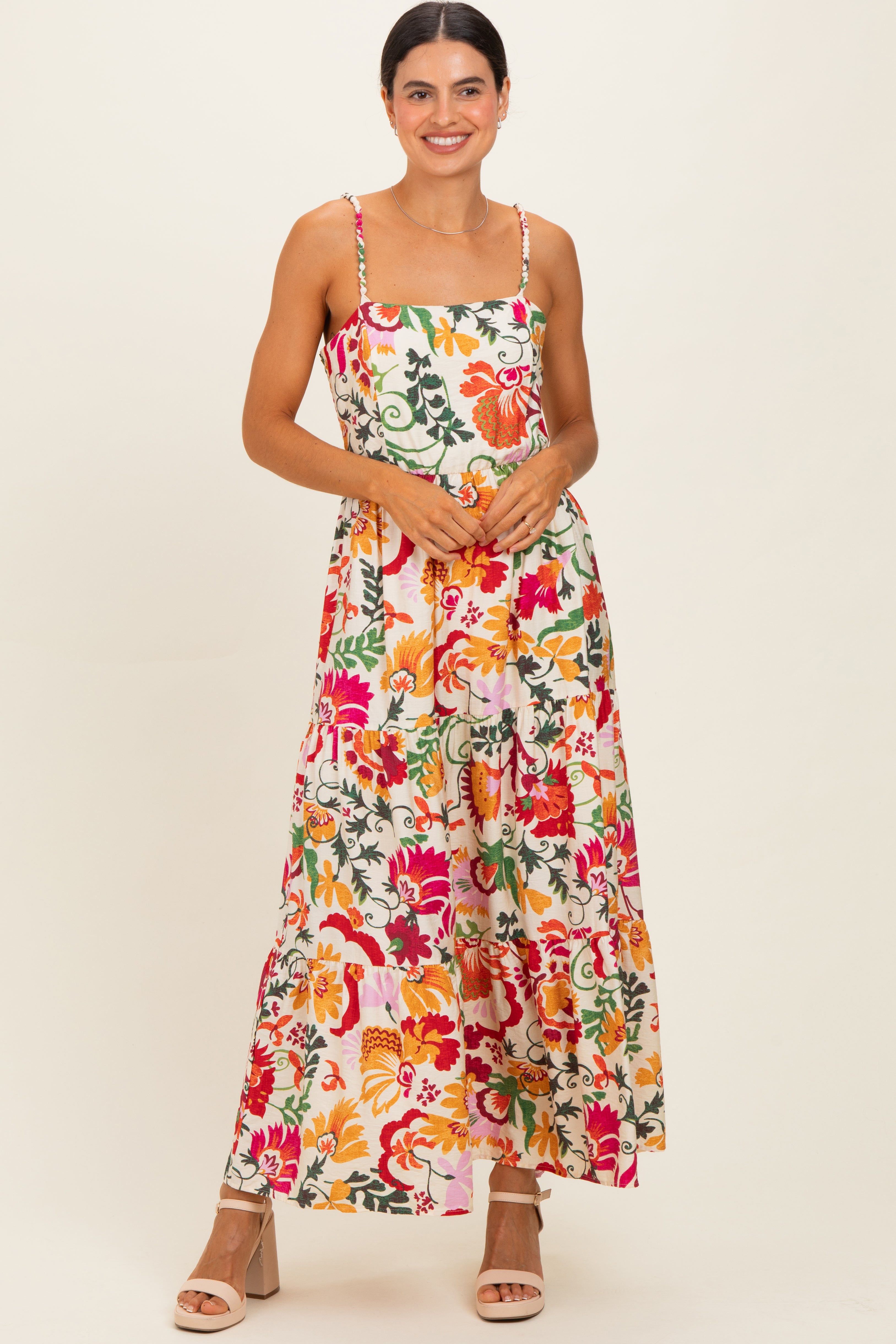 Cremefarbenes Umstands-Midikleid mit Blumenmuster und Stufenrock
