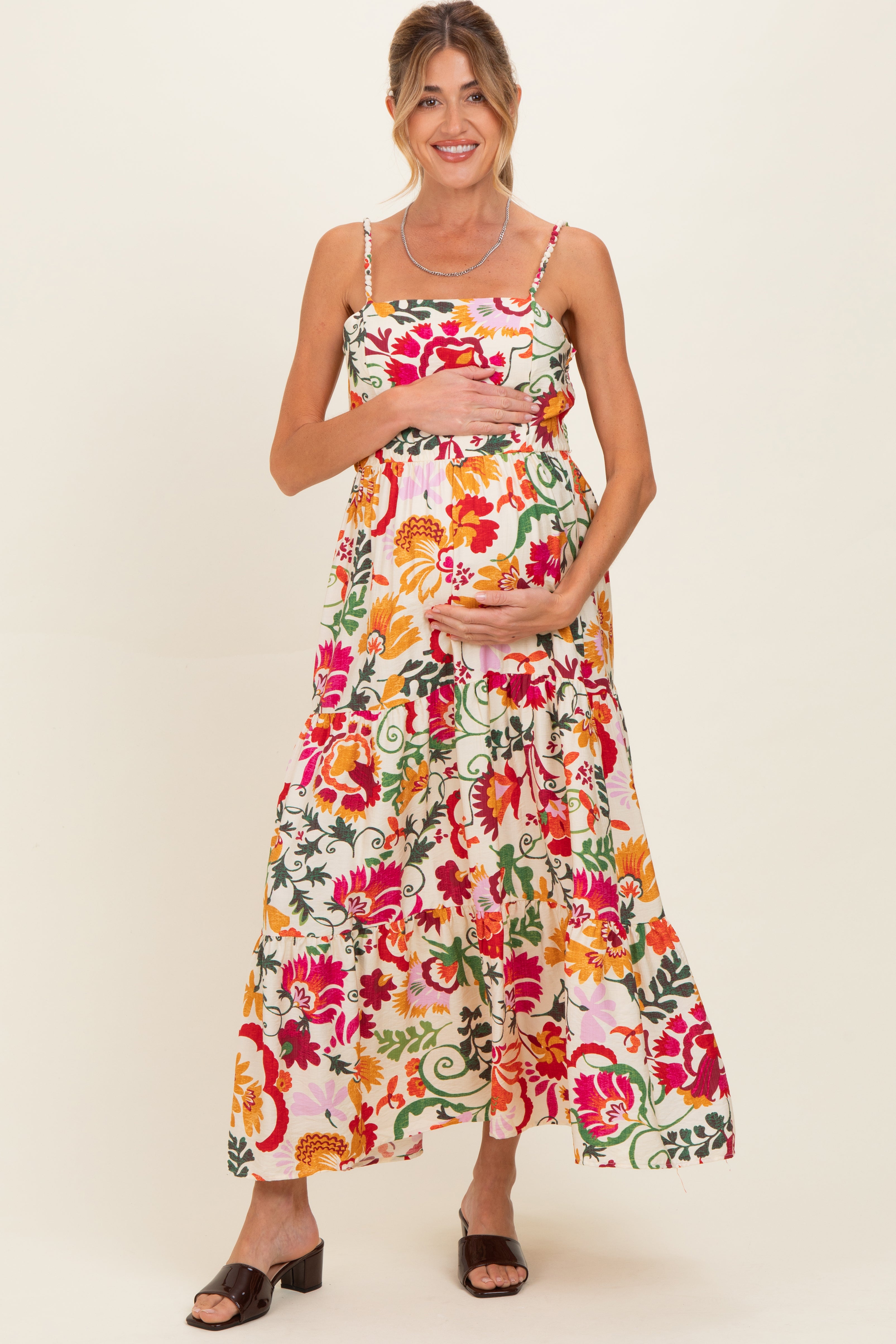 Cremefarbenes Umstands-Midikleid mit Blumenmuster und Stufenrock