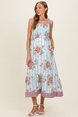 Umstandsmaxikleid in Französischblau mit Blumen-Streifen-Muster und Kontrastträgern