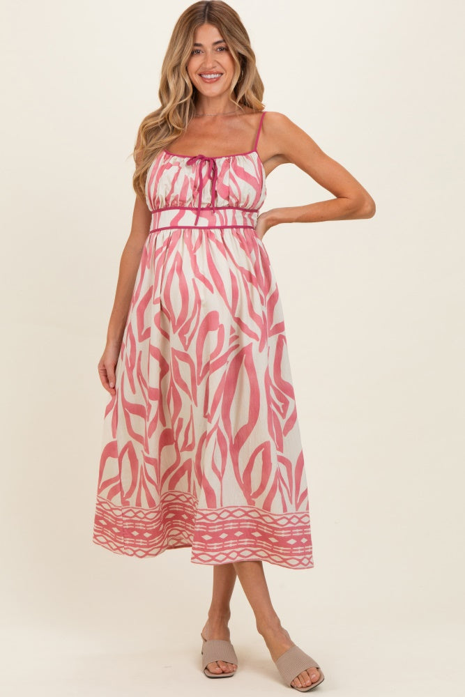 Rosafarbenes Umstands-Midikleid mit Print und Bindedetail vorn