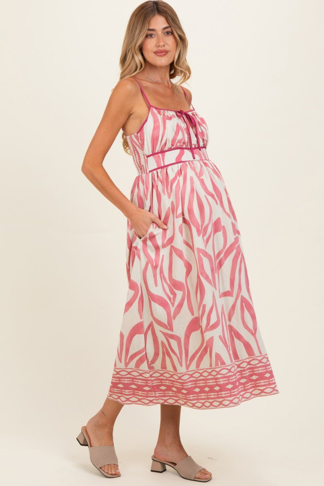 Rosafarbenes Umstands-Midikleid mit Print und Bindedetail vorn