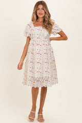 Elfenbeinfarbenes Umstands-Minikleid mit floraler Stickerei