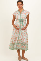 Umstands-Hemdblusenkleid in Oliv mit kontrastierendem Blumenmuster