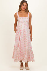 Umstands-Maxikleid in Rosa mit Pfingstrosen-Blumenmuster