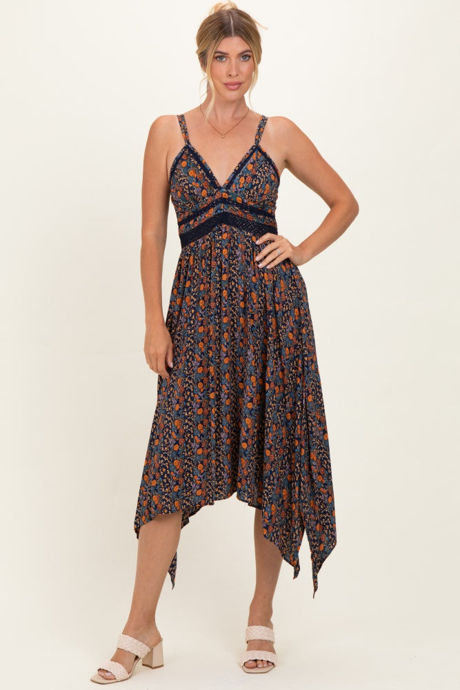 Umstands-Kleid in Marineblau mit Blumenmuster, V-Ausschnitt, Spitzenbesatz und Zipfelsaum