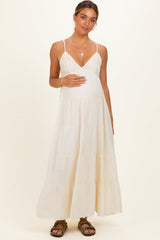 Umstands-Maxikleid in Creme mit Häkeldetail, Stufenrock und Schulterbändern
