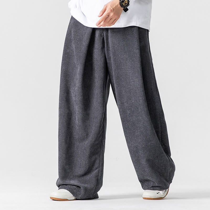 Einfarbige Herrenhose aus Baumwollcord mit weitem Bein und Taschen