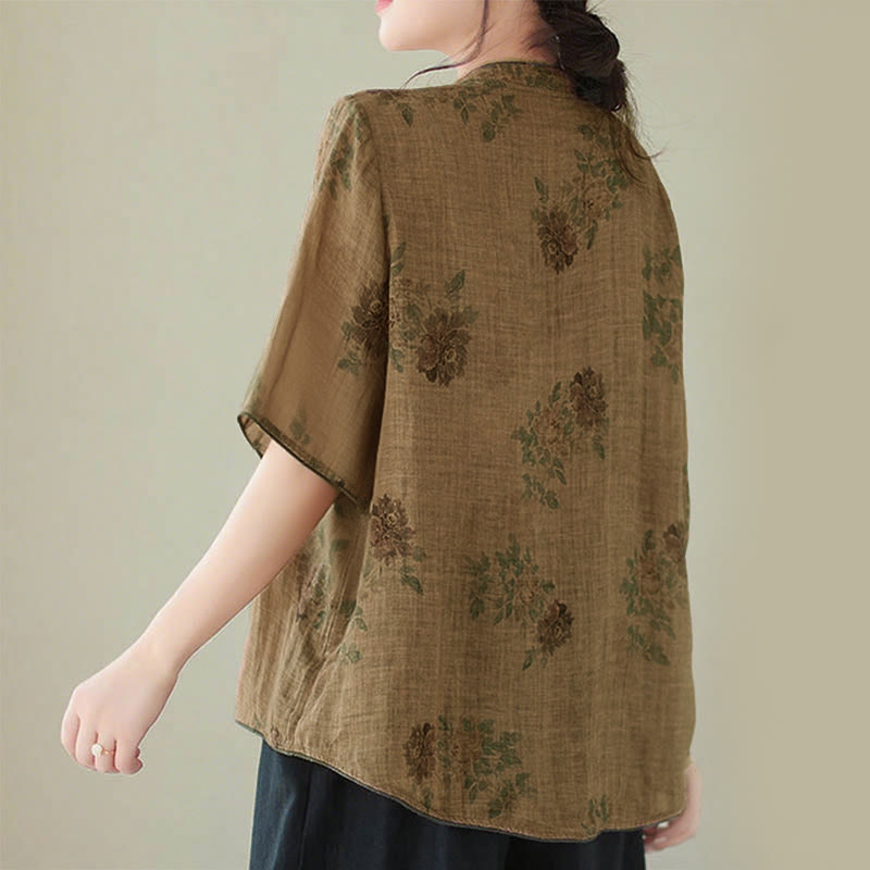 Damenhemd in Lila mit Blumendruck und Froschknopf-Design