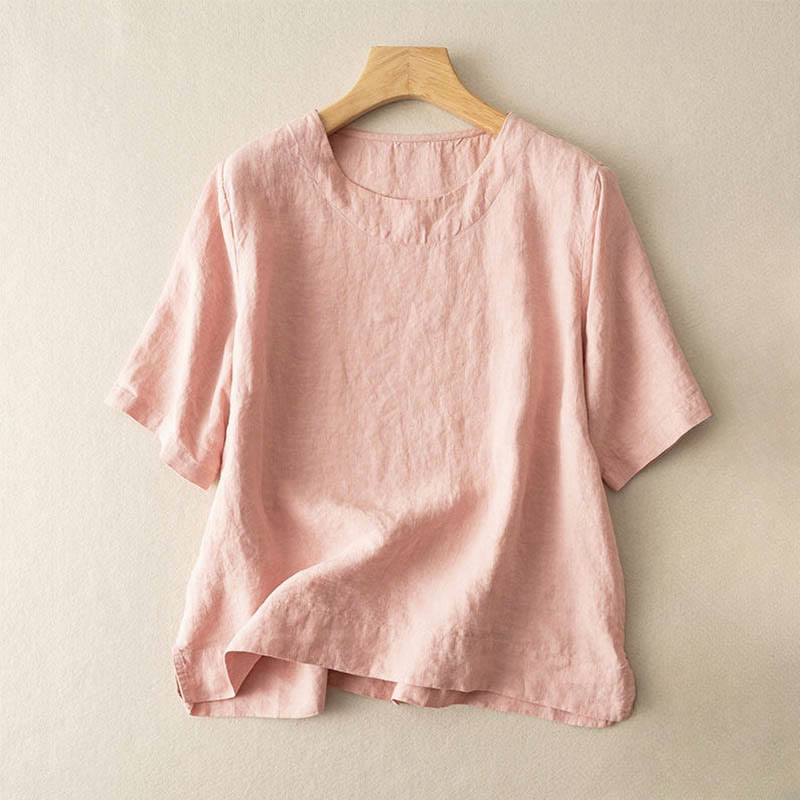 Schlichtes, einfarbiges, kurzärmliges Damen-T-Shirt aus Baumwolle mit Rundhalsausschnitt und Seitenschlitz