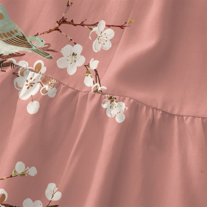 Lässiges, sommerliches, ärmelloses Midikleid für Damen mit Blüten, Vogel- und Zweigmuster und Taschen