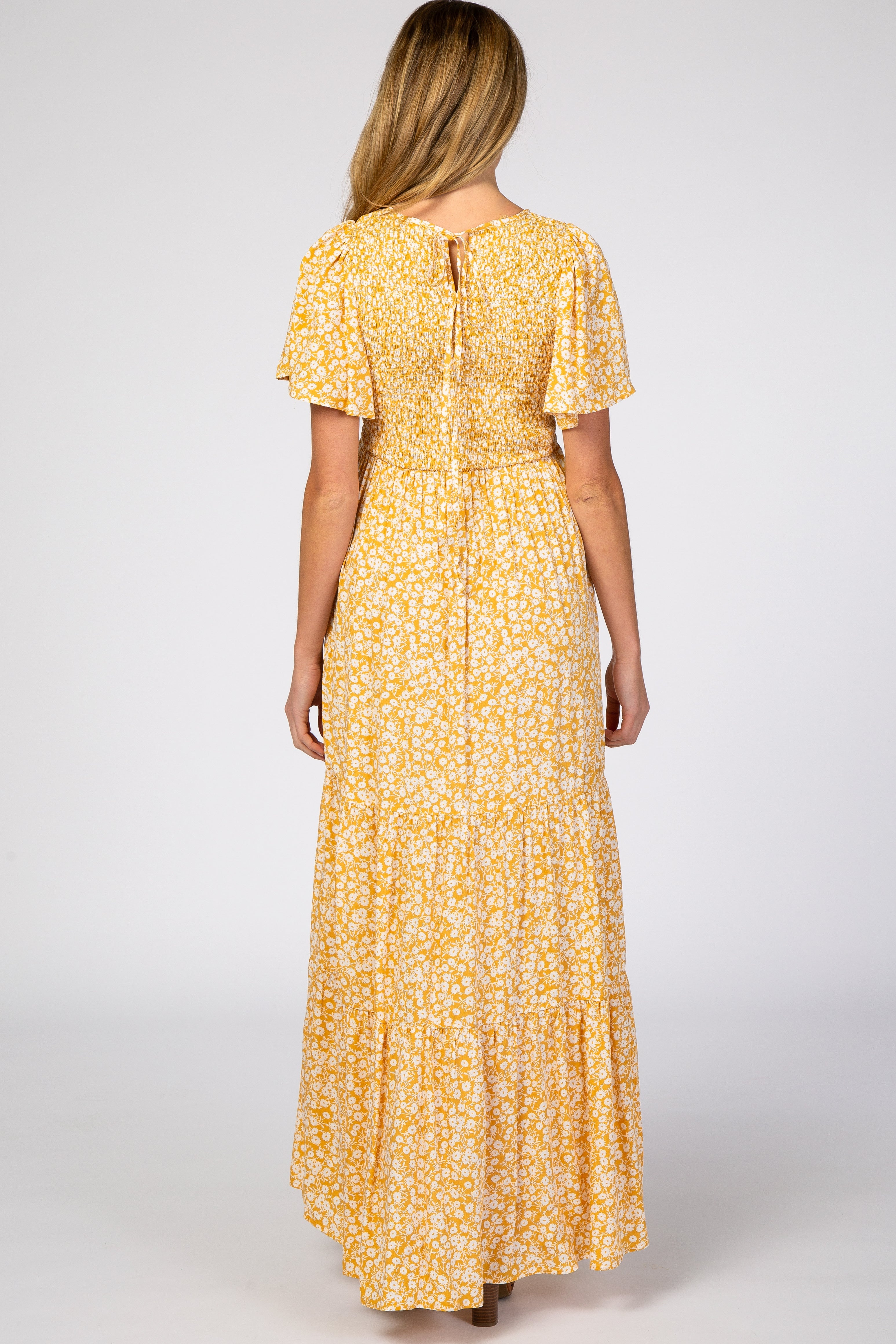 Umstandsmaxikleid mit Blumenmuster und plissiertem Saum