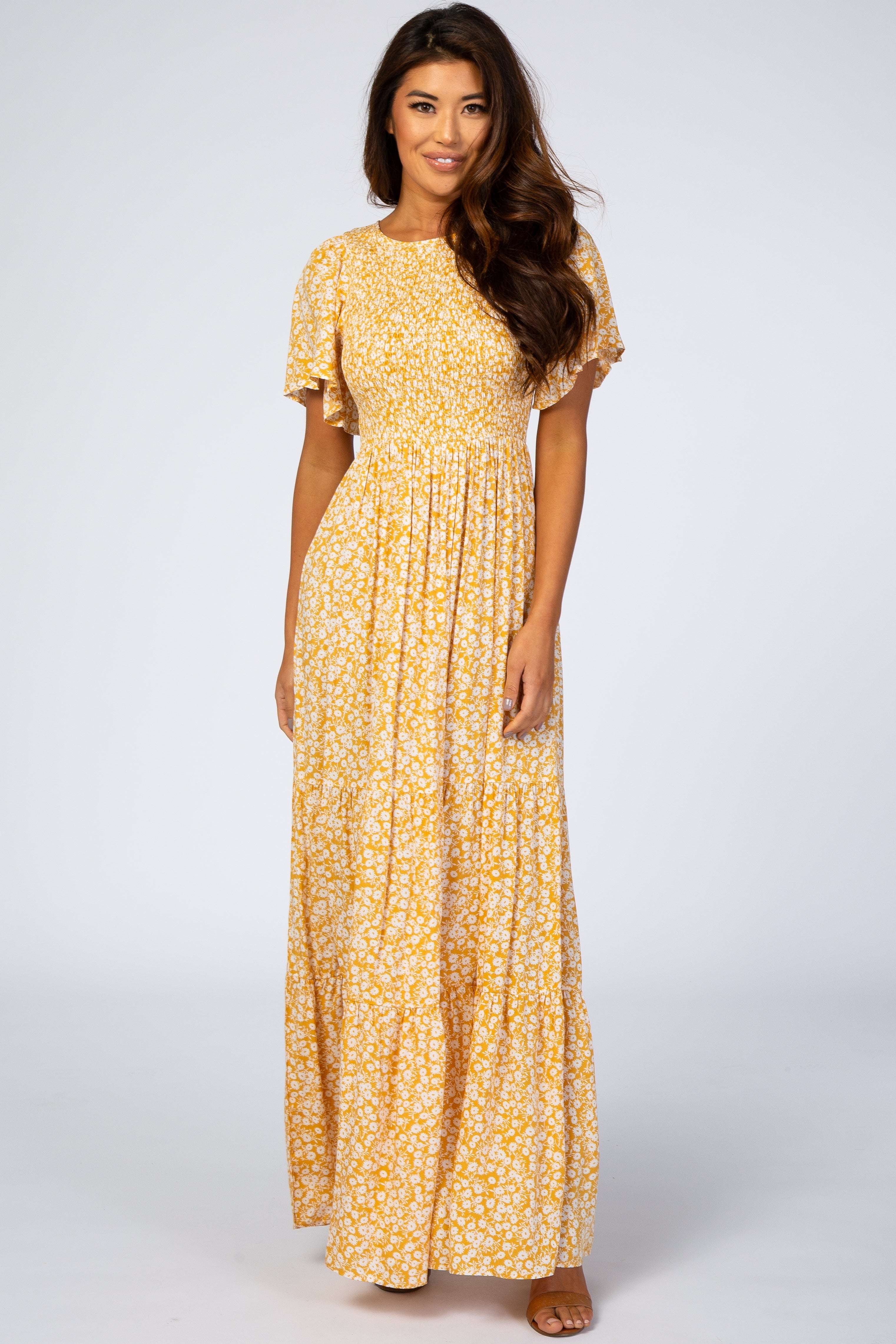 Umstandsmaxikleid mit Blumenmuster und plissiertem Saum