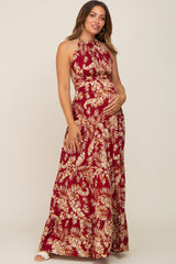 Gestuftes Umstandsmaxikleid mit Palmenprint, Neckholder und offenem Rücken