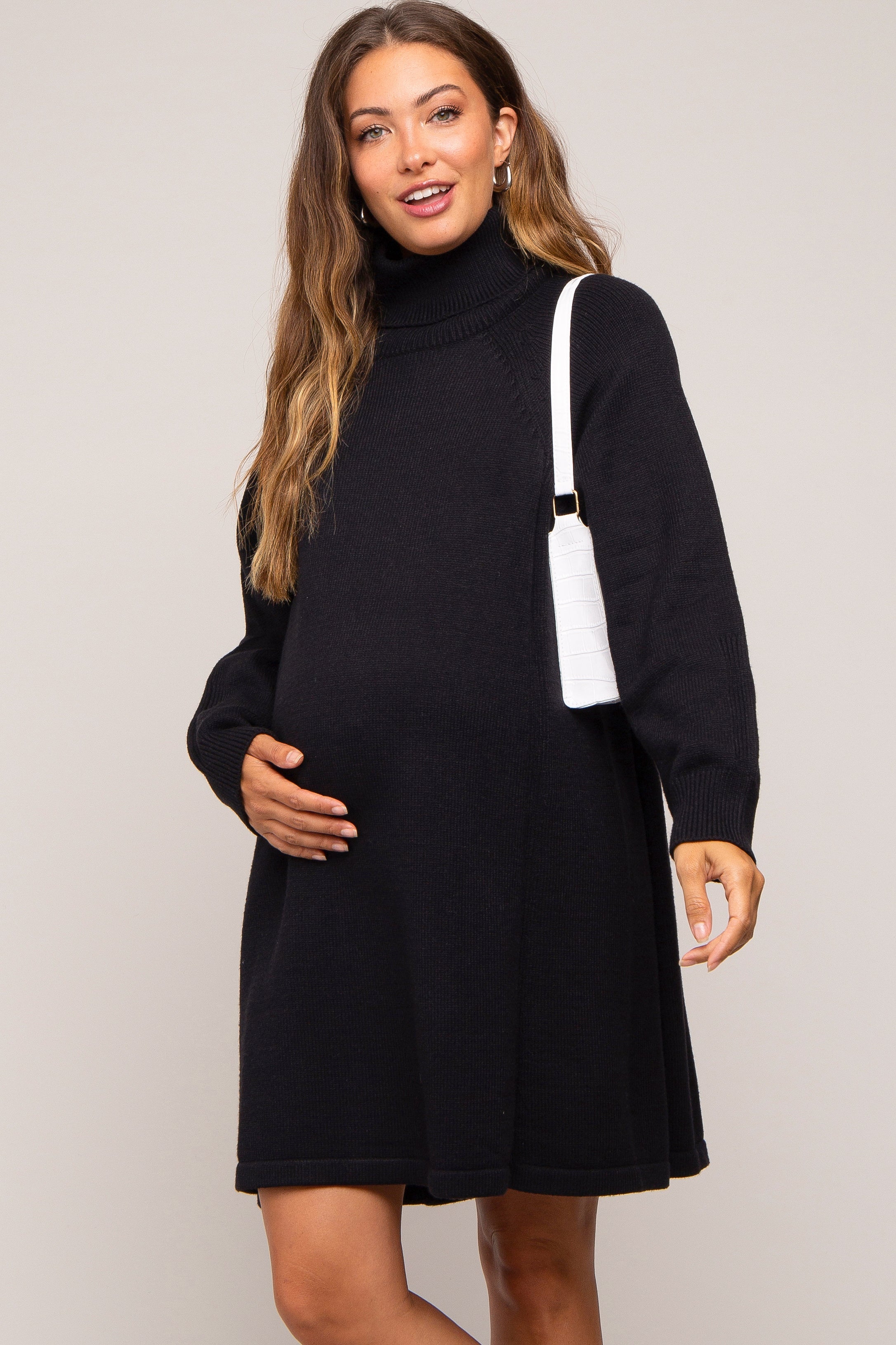 Umstands-Pulloverkleid mit Rollkragen und langen Ärmeln in Schwarz