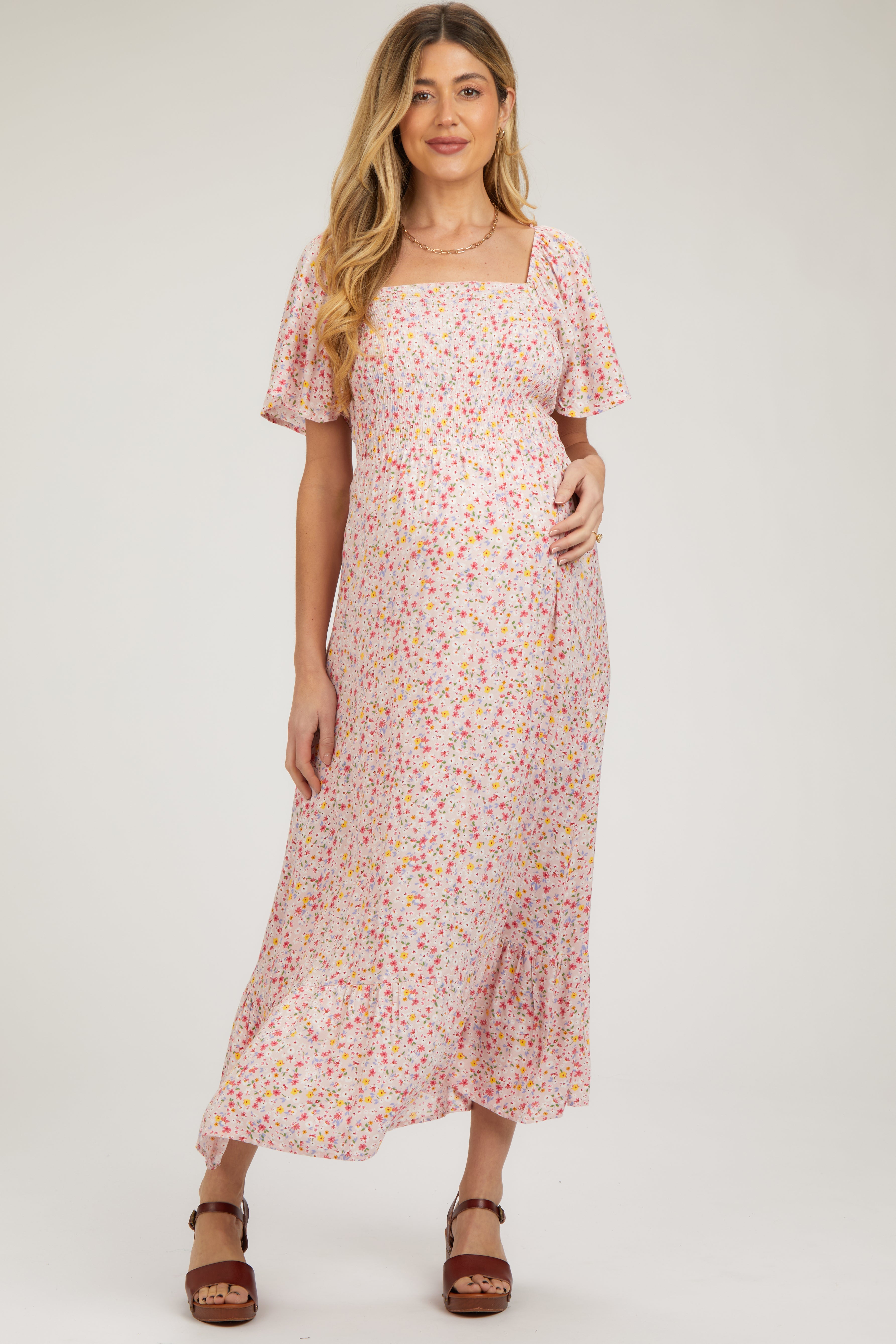 Umstandsmaxikleid mit Blumenmuster und Smok-Detail